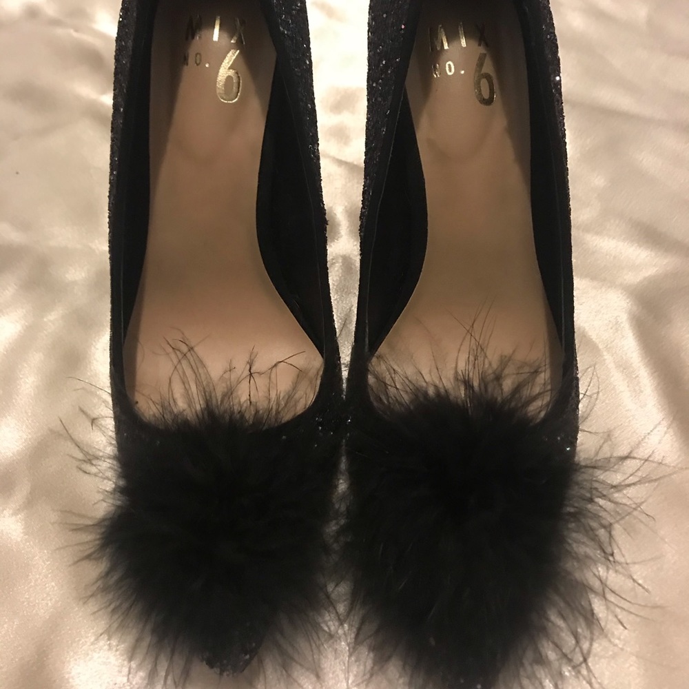 Black sparkly heels with feathers